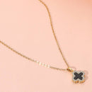 Reversible quatrefoil pendant necklace dual sided design