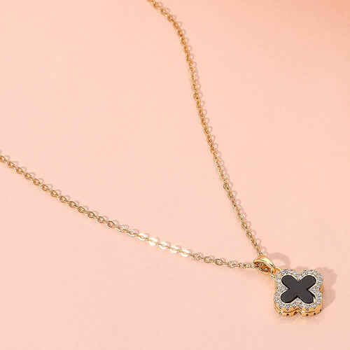 Reversible quatrefoil pendant necklace dual sided design