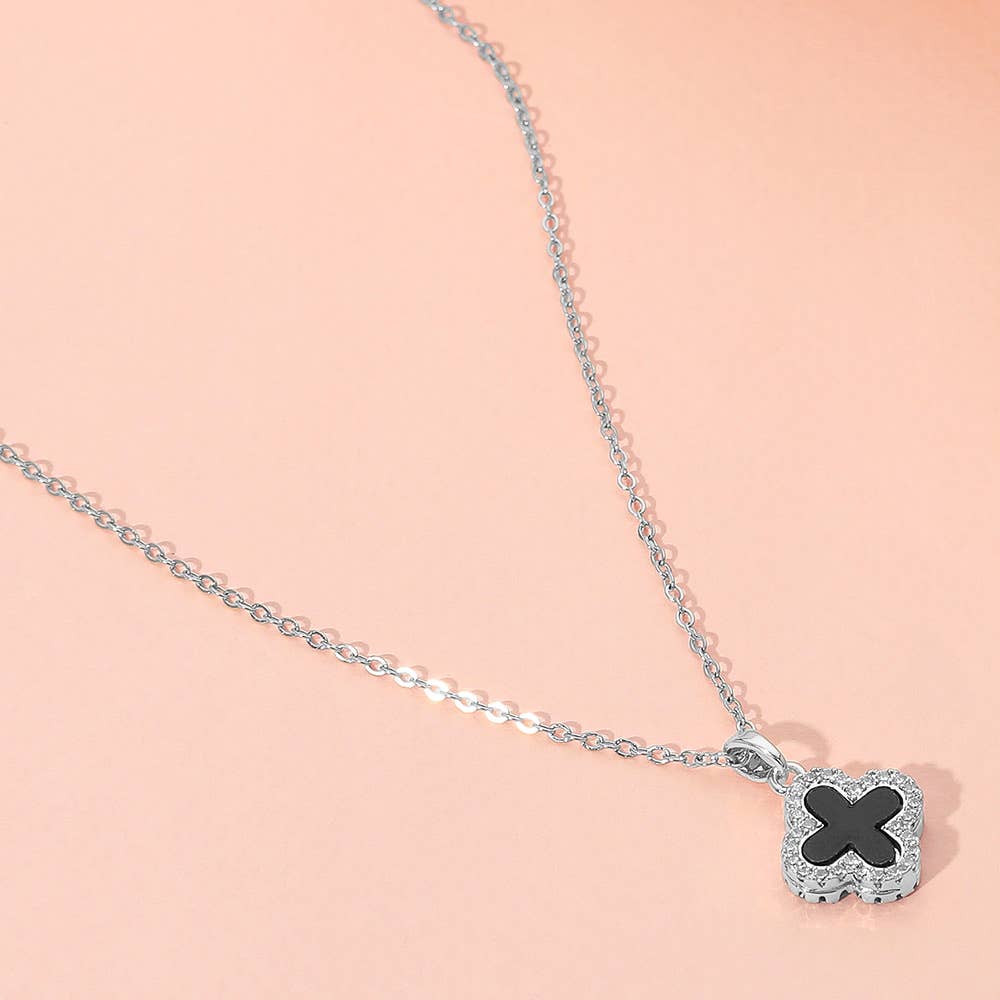 Stylish reversible quatrefoil pendant necklace close up