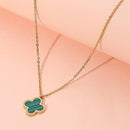 Stainless steel quatrefoil pendant necklace close up