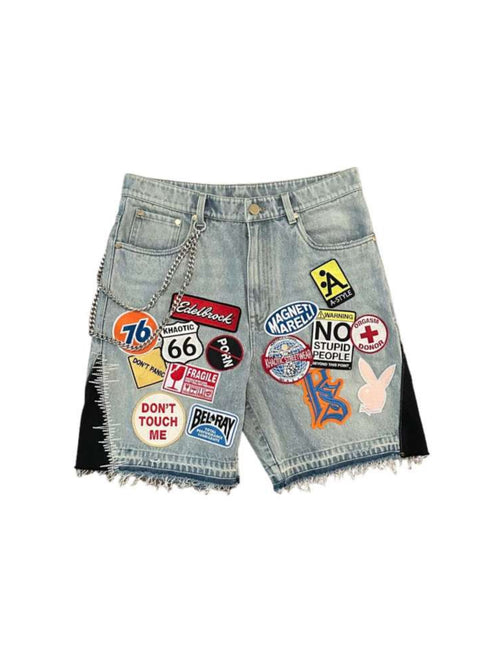 Woman wearing multi patch distressed denim shorts