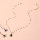 Reversible quatrefoil pendant necklace fashion accessory