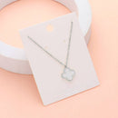 Stainless steel quatrefoil pendant necklace close up