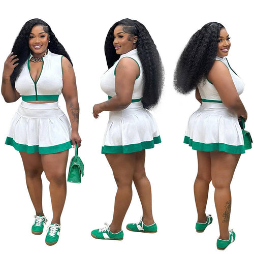 Sporty skirt set women matching outfit featuring a cropped zip top and pleated skirt in white and green.