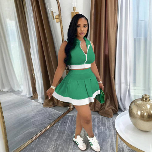 Sporty skirt set women matching outfit featuring a green zip crop top and pleated mini skirt for casual style.